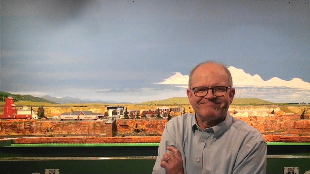 Mike Burgess says: Greetings from my N Scale Railroad Layout (hobbies are necessary and valuable in times like this).  Fortunately, I have friends with lots of talent.